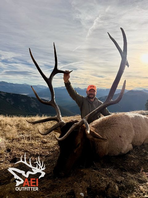 Topher with a last day hammer of a 6x6 bull elk